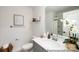 Modern bathroom with gray vanity, updated fixtures, and a shower/tub combo at 4120 Claret Cup Dr # 34, Kannapolis, NC 28083