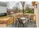 Small back deck with seating area and backyard view at 419 E Fisher St, Salisbury, NC 28144