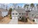 Two-story house, stone accents, two-car garage, neighborhood view at 4836 Pepper Dr, Harrisburg, NC 28075
