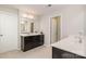 Main bathroom with double vanity and large shower at 4836 Pepper Dr, Harrisburg, NC 28075