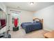 Bright bedroom with a large bed and window at 4836 Pepper Dr, Harrisburg, NC 28075