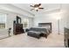 Spacious bedroom with large bed and dresser at 4836 Pepper Dr, Harrisburg, NC 28075