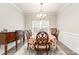 Formal dining room with hardwood floors and chandelier at 4836 Pepper Dr, Harrisburg, NC 28075