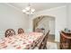 Formal dining room with hardwood floors and chandelier at 4836 Pepper Dr, Harrisburg, NC 28075