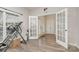 Home office with French doors and hardwood floors at 4836 Pepper Dr, Harrisburg, NC 28075