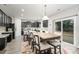 Modern kitchen with dark cabinets and granite countertops at 4836 Pepper Dr, Harrisburg, NC 28075