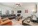Spacious living room featuring a fireplace and comfortable seating at 4836 Pepper Dr, Harrisburg, NC 28075