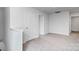 Upstairs hallway with carpet and doors to bedrooms at 542 Stroupe Rd, Gastonia, NC 28056