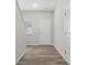 Bright entryway with vinyl plank flooring and neutral walls at 6707 W Sugar Creek Rd, Charlotte, NC 28269