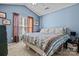 Spacious bedroom with a king-size bed and light blue walls at 7613 Rolling Meadows Ln, Huntersville, NC 28078