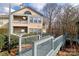 Exterior view of condo building with walkway and landscaping at 8121 #E Tremaine Ct, Charlotte, NC 28227
