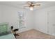 Bedroom with window, ceiling fan, and closet at 9530 Harris Glen Dr, Charlotte, NC 28269