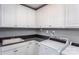 Laundry room with white cabinets and dark countertops at 1009 Kinship Dr # 71, Lancaster, SC 29720