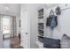 White-washed mudroom with bench, cubbies, and hooks at 1009 Kinship Dr # 71, Lancaster, SC 29720