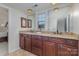 Elegant bathroom with double vanity and granite countertops at 11613 Old Surry Ln, Charlotte, NC 28277