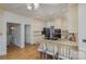 Bright kitchen, granite counters, island with cooktop at 11613 Old Surry Ln, Charlotte, NC 28277