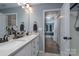 Bathroom with double vanity and bedroom view at 123 Kingfisher Dr, Mooresville, NC 28117