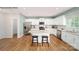 Modern kitchen with white cabinets and granite island at 197 Giant Oak Ave, Statesville, NC 28677