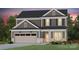 Two-story house with gray siding, beige garage door, and landscaping at 2208 Millennium Dr # 88, Lancaster, SC 29720