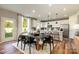 Modern kitchen with white cabinets, island, and stainless steel appliances at 2208 Millennium Dr # 88, Lancaster, SC 29720