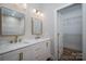 Elegant bathroom with double vanity, marble countertop, and gold fixtures at 2462 Shoal Rd # 11, Crouse, NC 28033