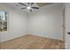 Bedroom featuring wood-look floors and ceiling fan at 305 Washington St # 1, York, SC 29745