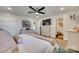 Main bedroom with a king-size bed and walk-in closet at 402 Lake Shore Dr, Fort Mill, SC 29715