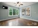 Gathering room with hardwood floors and backyard access at 6156 Falls Ridge Trl, Sherrills Ford, NC 28673