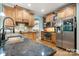 Kitchen with granite countertops and wood cabinets at 6156 Falls Ridge Trl, Sherrills Ford, NC 28673