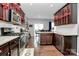 Modern kitchen with island, stainless steel appliances, and granite countertops at 6416 Ellimar Field Ln, Charlotte, NC 28215