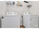 Convenient laundry room with washer and dryer at 6416 Ellimar Field Ln, Charlotte, NC 28215