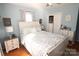 Spacious bedroom with light walls and a ceiling fan at 114 Yates St, Dallas, NC 28034