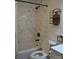 Updated bathroom with marble tile and modern fixtures at 208 Nila Dawn Ave, Gastonia, NC 28052