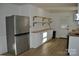 Modern kitchen with white shaker cabinets and butcher block countertops at 208 Nila Dawn Ave, Gastonia, NC 28052