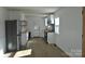 Modern kitchen with white cabinets and stainless steel appliances at 208 Nila Dawn Ave, Gastonia, NC 28052