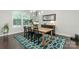 Elegant dining room featuring hardwood floors and modern light fixture at 2118 Lometa Rd, York, SC 29745