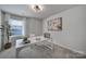 Home office features a white desk and calming decor at 214 Audra Faye Ln, Indian Trail, NC 28079