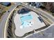 Aerial view of community pool with separate kiddie pool and clubhouse at 2547 Bullfrog Ln, Lancaster, SC 29720