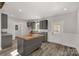 Modern kitchen with gray cabinets and butcher block island at 3290 Mt Prospect Rd, Chester, SC 29706