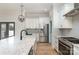 Modern kitchen with marble countertops and stainless steel appliances at 419 Sylvania Ave, Charlotte, NC 28206