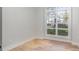 Bright home office space with hardwood flooring and a large window at 419 Sylvania Ave, Charlotte, NC 28206