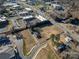 Aerial view of house and lot in relation to nearby businesses at 504 Mclean Ave, Belmont, NC 28012