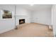 Finished basement with fireplace and tile floors at 523 Hyde St, Kannapolis, NC 28083