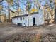 Rear view of white brick ranch house with central AC unit at 523 Hyde St, Kannapolis, NC 28083