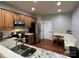 Modern kitchen with granite countertops and stainless steel appliances at 8962 Kirkley View Ct # 94, Charlotte, NC 28277