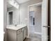 Bathroom with vanity and view into living area at 1018 Timber Spring Ln, Salisbury, NC 28147