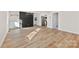 Bright dining area with hardwood floors and a modern accent wall at 1024 8Th St, Statesville, NC 28677