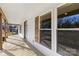 Inviting front porch with wood flooring and stylish shutters at 1024 8Th St, Statesville, NC 28677