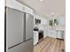 Modern kitchen featuring stainless steel appliances and white cabinetry at 1024 8Th St, Statesville, NC 28677