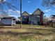 Spacious backyard with shed and basketball hoop at 1102 N Hayne St, Monroe, NC 28112